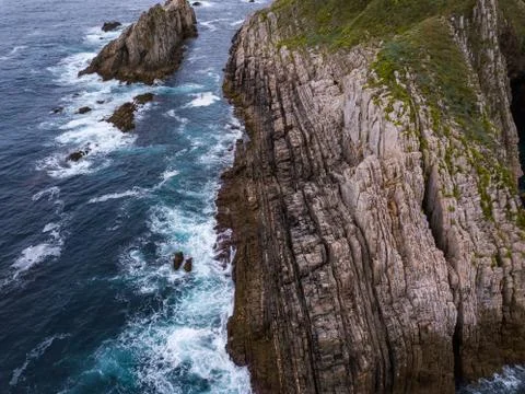Aerial view of the coastline and cliffs at Silencio Beach. Northern Spain in Stock Photos