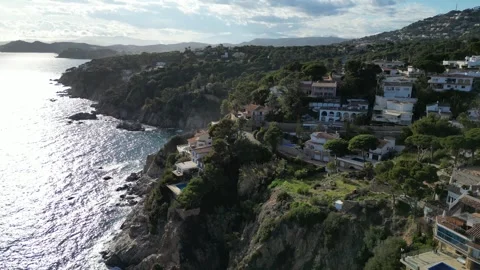 Aerial view, coastline with mountain, cliffs and villas,4K Stock Footage 274843559
