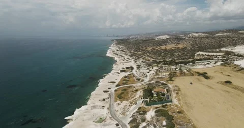 Aerial view of coastline with sandy beach and cliffs, Cyprus. Stock Footage 312837873
