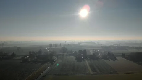 Aerial view of a cold and misty countryside Vidéo 126728495