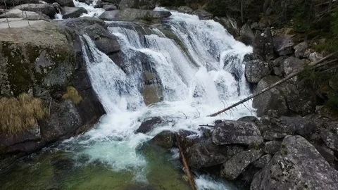 Aerial view of a cold small waterfall in High Tatras Mountains Stock Footage 126098659