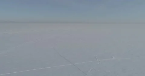 Aerial view of cold winter landscape arctic field, trees covered with frost snow Stock Footage 156790923