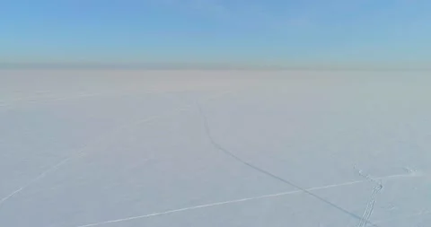 Aerial view of cold winter landscape arctic field, trees covered with frost snow Stock Footage 165572705