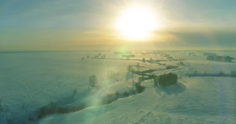 Aerial view of cold winter landscape arctic field, trees covered with frost snow Stock Footage 169973957