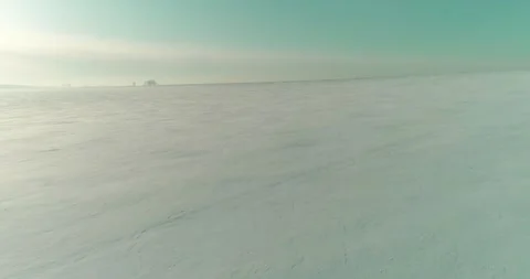 Aerial view of cold winter landscape arctic field, trees covered with frost snow Stock Footage 287296536