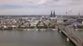 Aerial View Cologne Skyline Establishing Shot Cityscape Hohenzollern Bridge Day HD Footage