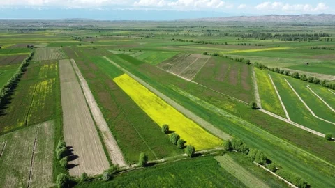 Aerial view of colorful farm fields in Kyrgyzstan. Stock Footage 339244337