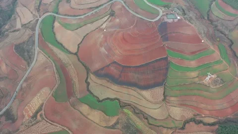 Aerial view of colorful terraced fields and red soil in Dongchuan, Yunnan, China Vídeos de archivo 345046663