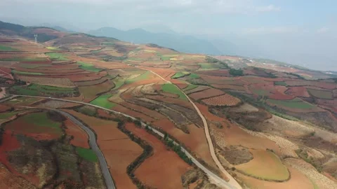 Aerial view of colorful terraced fields and red soil in Dongchuan, Yunnan, China 스톡 동영상 345046949