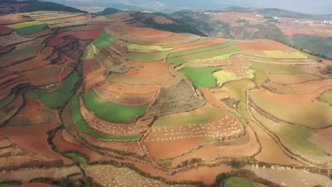 Aerial view of colorful terraced fields in Dongchuan Red Land, Yunnan, China Vídeos de archivo 345047245