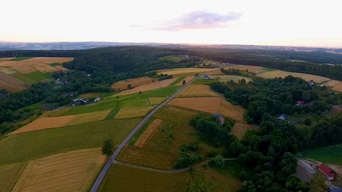 Aerial view of colourful fields and sunset Stock Footage 127366610