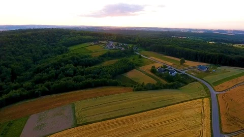 Aerial view of colourful fields and sunset Stock Footage 127366627