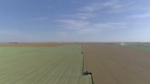 Aerial view of combine during Fall harvest near Regina, Saskatchewan. Video stock 153440643