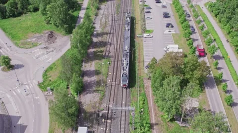 Aerial view of the commuter train, Espoo city, Finland. Stock Footage 198716486