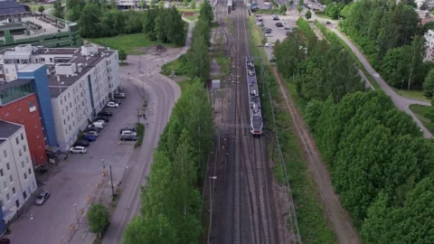 Aerial view of the commuter train, Espoo, Finland. Stock Footage 198716609