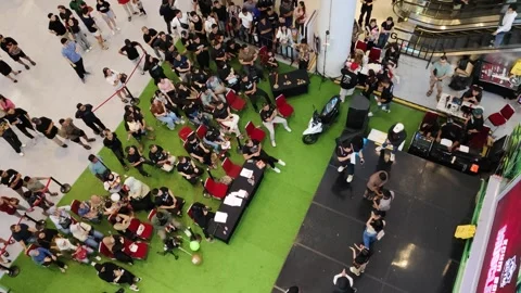 Aerial View of Competition Event with Crowd and Contestant on Stage Vídeos de archivo 311852995