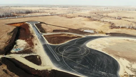 Aerial view of the completed road construction of test site for cars. Black Vídeo Stock 167348665