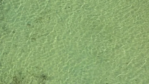 Aerial view of the completely transparent beach water. Stock Footage 264056238