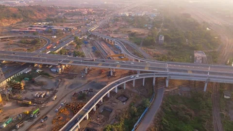 Aerial view of complex highway flyovers and multiple lanes Stock Footage 299787415