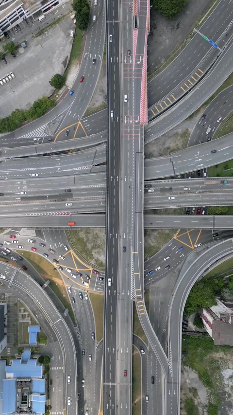 Aerial view of complex highway interchange with traffic in Kuala Lumpur Malaysia Stock Footage 306516881