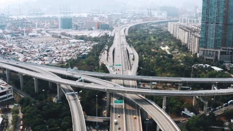 Aerial view of complex highway road junction with traffic moving Stock Footage 297645324