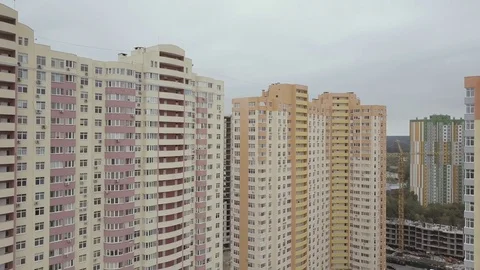 Aerial view. A complex of new high-rise apartment buildings in the city. Camera Stock Footage 79768540