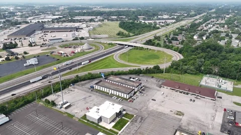 Aerial view of complex road infrastructure: interchanges, bridges and highways Stock Footage 311706765