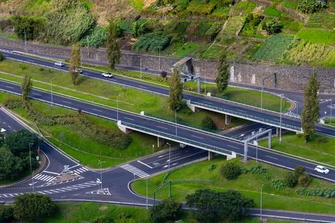 Aerial view of a complex road interchange with multiple lanes, overpasses, .. Stock Photos