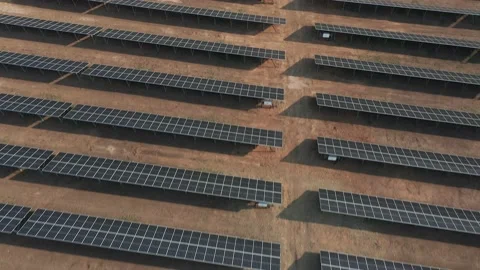 Aerial view of complex rows of solar panels recently installed on a solar farm. Stock Footage 147405224