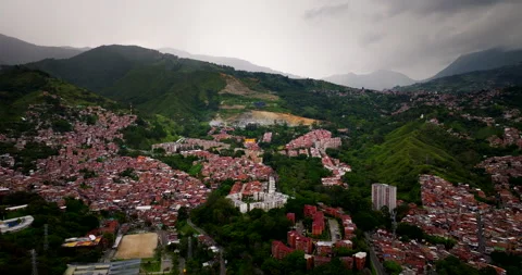 Aerial view of Comuna 13 and La Escombrera in Medellin, Colombia Stock Footage 333104598