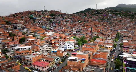 Aerial view of Comuna 13 dense favela neighborhood on hillside in Medellin Stock Footage 340405888