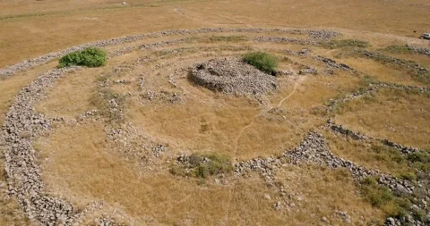 Aerial view of concentric stone circles. Rujum Al-Hiri, Golan Heights, Israel. Stock Footage 247191930