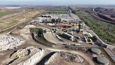 Aerial view of a concrete batching plant with trucks Video stock 339304291
