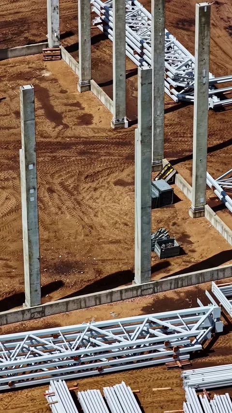 Aerial View of Concrete Columns and Steel Beams at Building Construction Site Vídeos de archivo 337748277