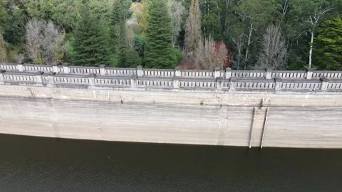 Aerial view of concrete dam wall Stock Footage 334907157