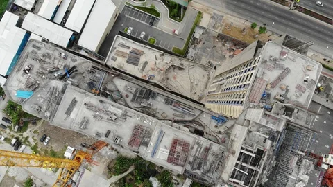 Aerial view condominium construction site building high rise with road Stock Footage 128182341