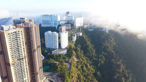 Aerial view of a condominium in the foreground of Genting Highlands, Malaysia Video stock 332322232