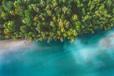 Aerial view coniferous forest and river drone landscape in Norway above trees Stock Photos