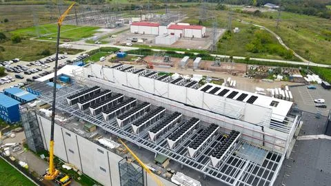 Aerial view constructing data center with cooling fans 写真素材