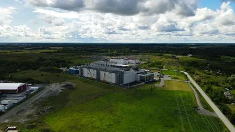 Aerial view constructing large data center with electrical substation Stockfoto's