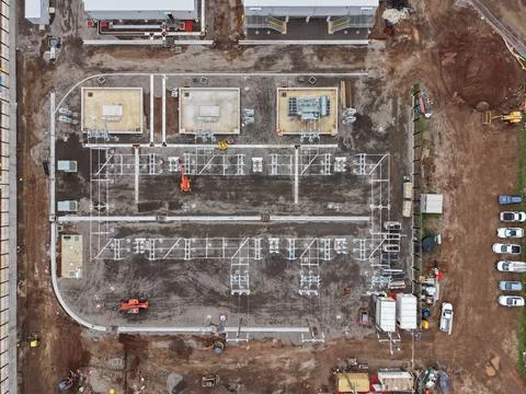 Aerial view constructing new electrical power substation grid Stock Photos