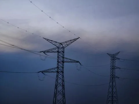AERIAL VIEW OF CONSTRUCTION AND MAINTENANCE OF HIGH VOLTAGE TOWERS Stock Photos