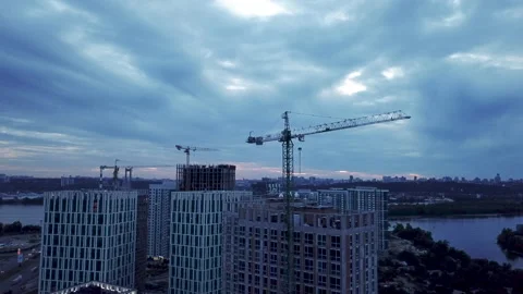 Aerial view of the construction crane and construction site. Drone shot. 4k Stock Footage 131761896
