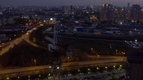 An aerial view of the construction crane and the construction of the building at Stock Footage 134488679