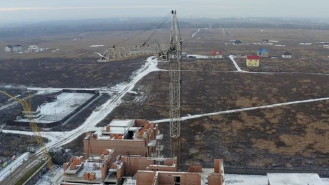 Aerial view of construction crane at winter time. Stock Footage 127370872