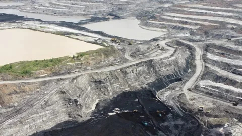 Aerial view of the construction of a dike to hold back water overflowing fr.. Stock Footage 327995507