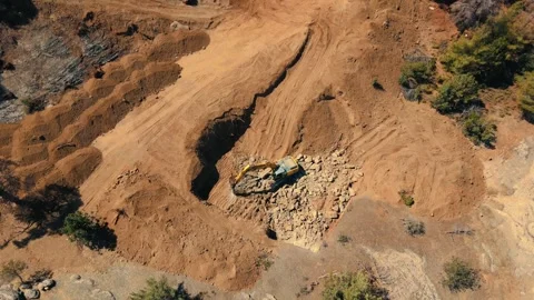 Aerial view construction equipment digging soil Stock Footage 331348687