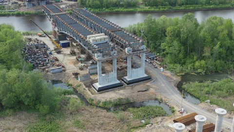 Aerial view of the construction of the highway , consisting of bridges, overp Stock Footage 108416402