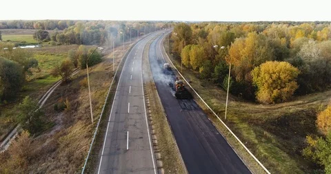 Aerial view: Construction of Highways. Hot Recycling Machines running on the Stockbeeldmateriaal 103306658