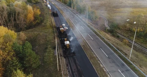 Aerial view: Construction of Highways. Hot Recycling Machines running on the Stockbeeldmateriaal 103307024